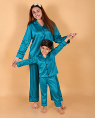 Mother and son in matching teal green Shamoz silk pajamas