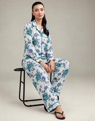 Blue Garden ivory floral imported linen pajama set, seated model view