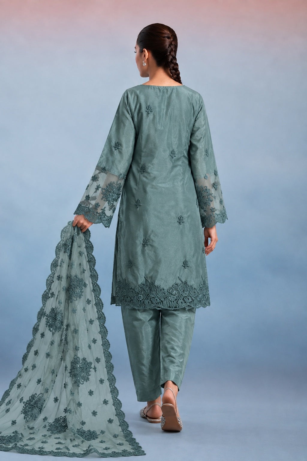 Sea green suit back view with embroidered net dupatta
